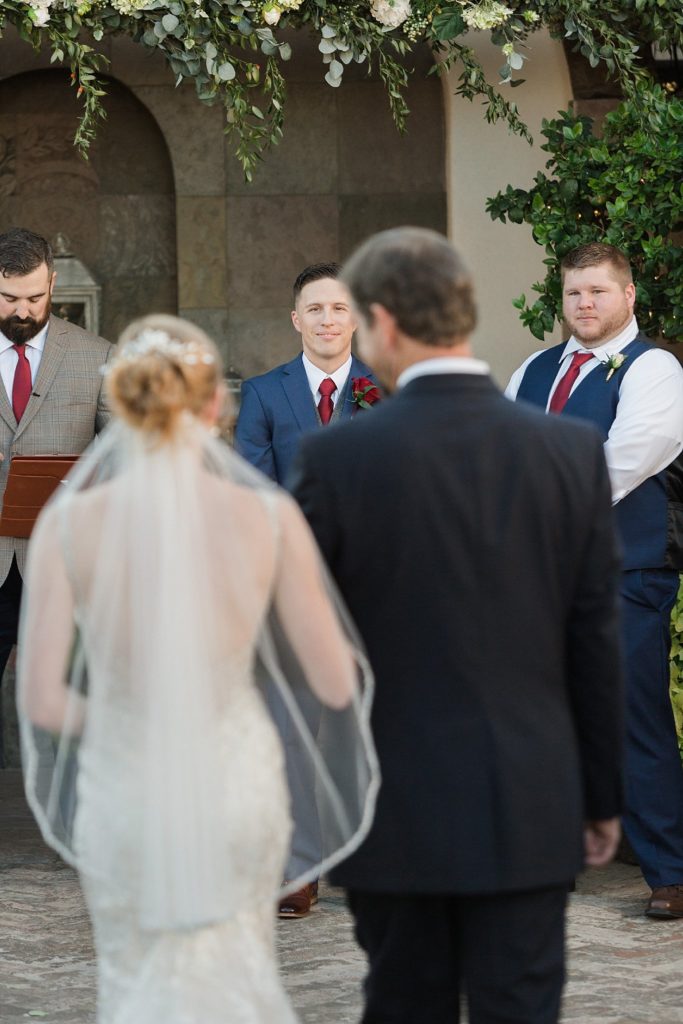groom sees bride 