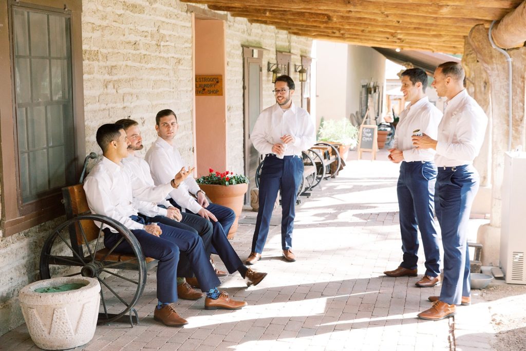 groom and groomsmen hanging out 